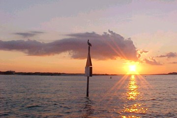 a sunset over a body of water